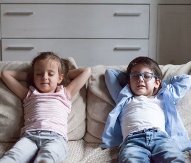 children relaxing on sofa in good air quality