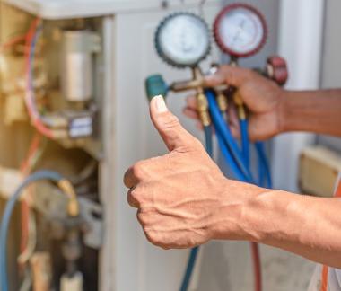 Crandall Heating and Air Technician thumbs up
